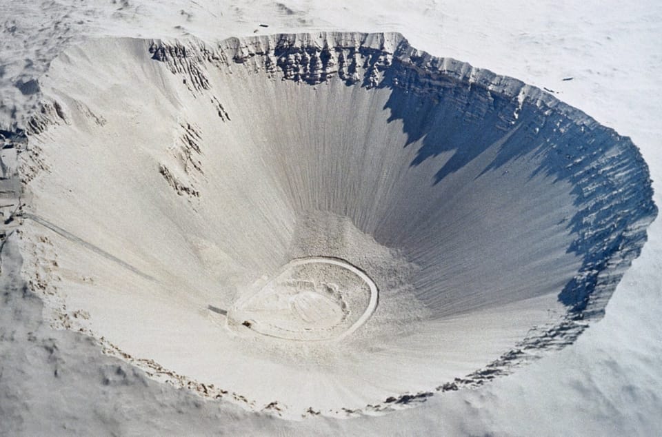 巨型撞击触发深层地幔熔融：Sudbury盆地揭示早期地球火山活动新机制